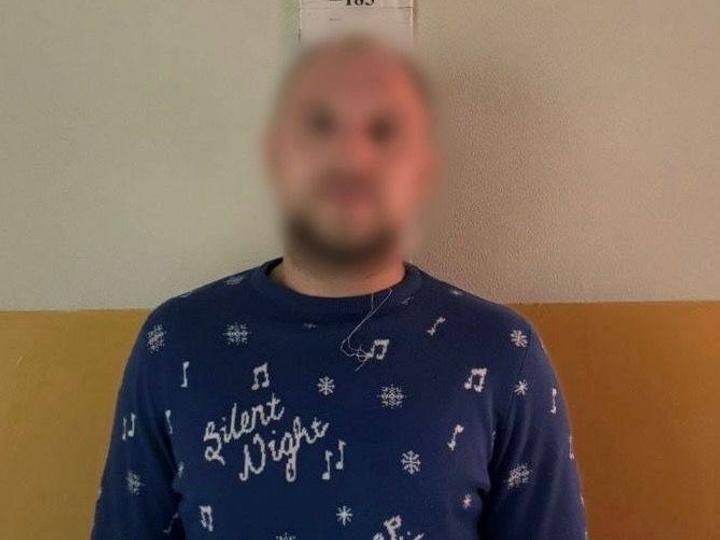Киянин дебоширив з сокирою посеред вулиці та хотів забрати скутер у підлітка